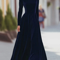 Dark blue velvet dress with high neck, long sleeves, fitted bodice, flared skirt