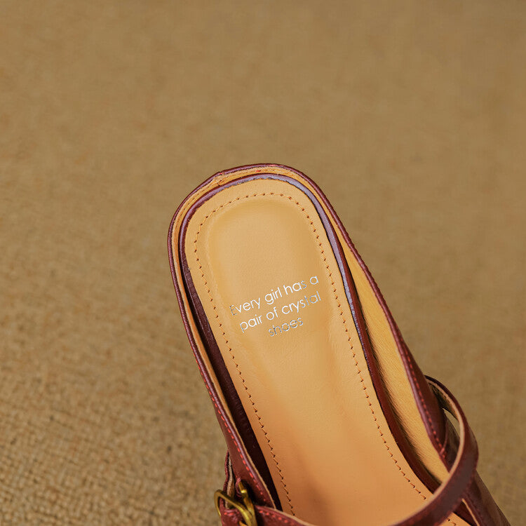 Maroon leather mule insole close-up with stitched trim and partial interior text