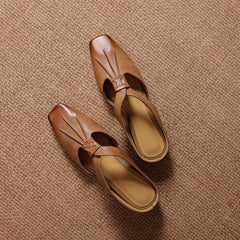Tan square-toe genuine leather mules with front cutout strap and slip-on design.