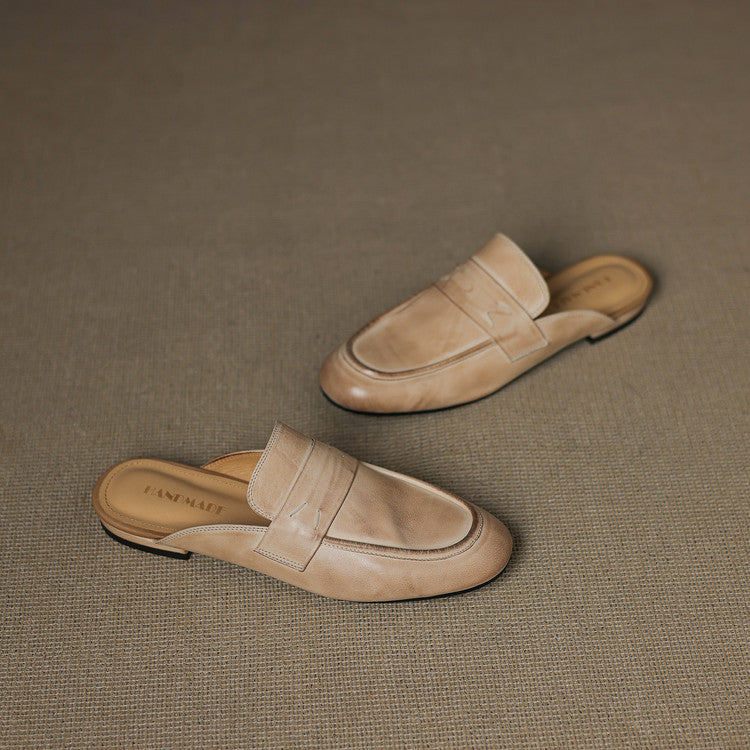 Beige and tan leather slip-on mules, flat sole and stitched vamp detail