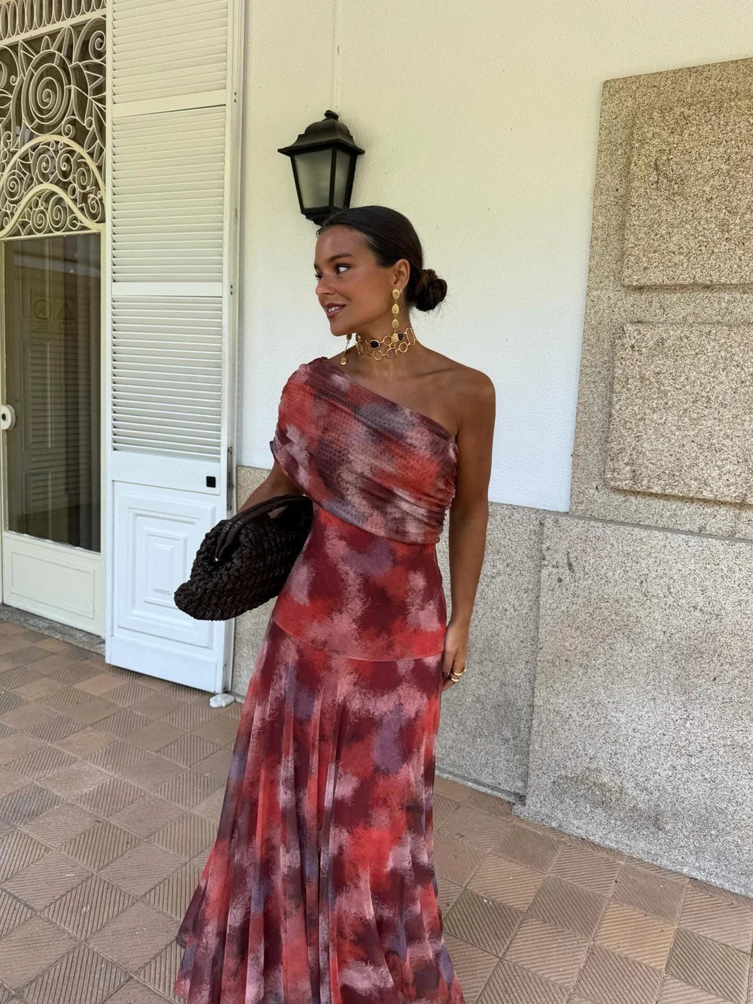 Red and purple tie-dye off-shoulder maxi dress with ruched neckline and long skirt