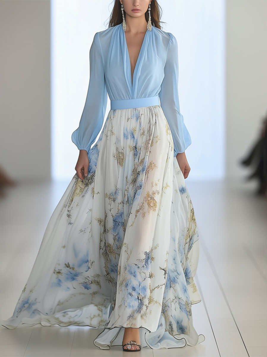 Light blue maxi dress with plunging V-neck, sheer long sleeves, floral print skirt