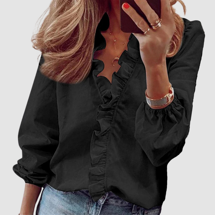 Black ruffle V-neck blouse with long puff sleeves and button front