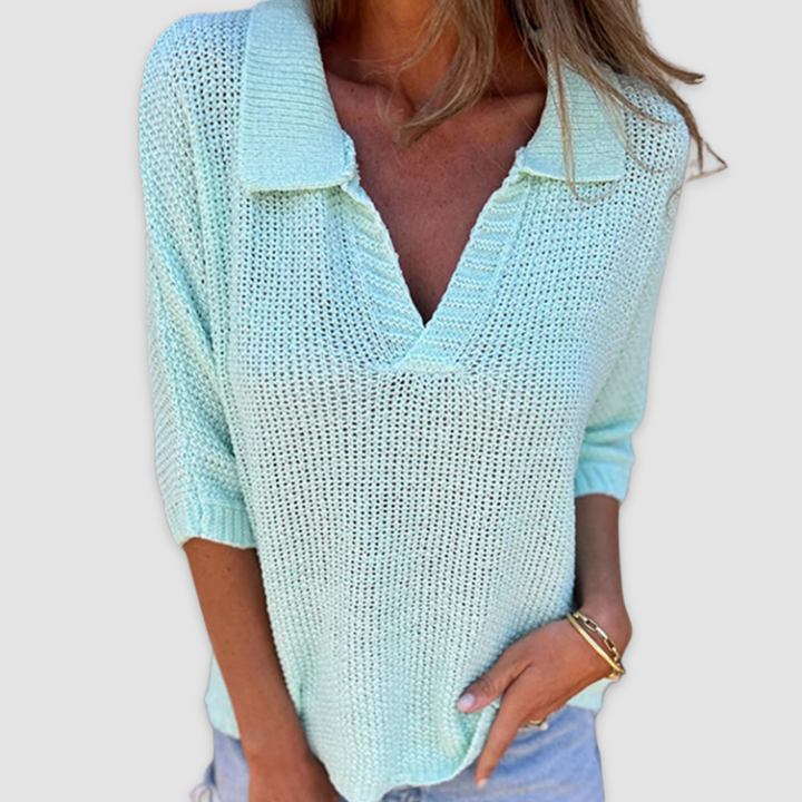 Light blue textured V-neck knit top with collared neckline and three-quarter sleeves