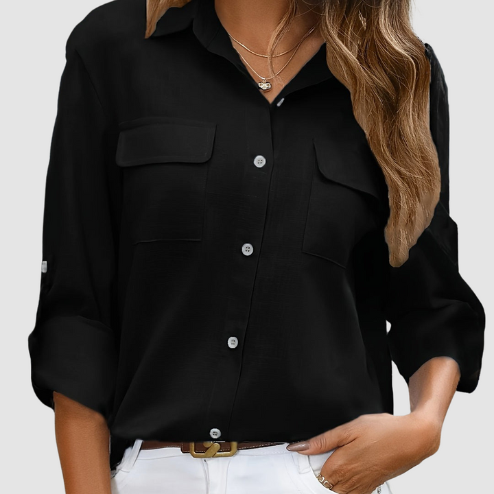 Black button-up pocket blouse with point collar and long sleeves