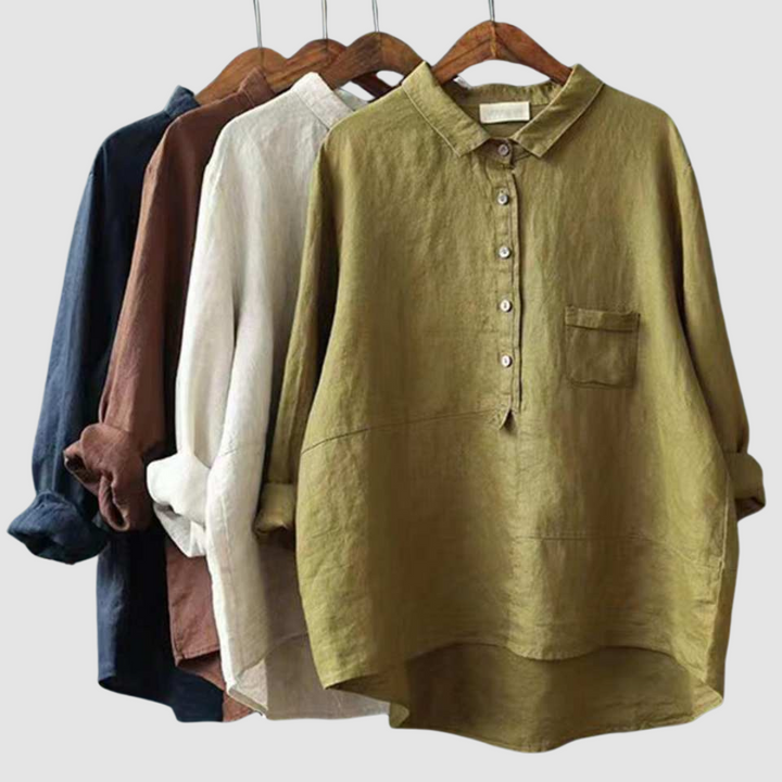 Assorted color breathable button-front blouses on hangers, each with collar and pocket