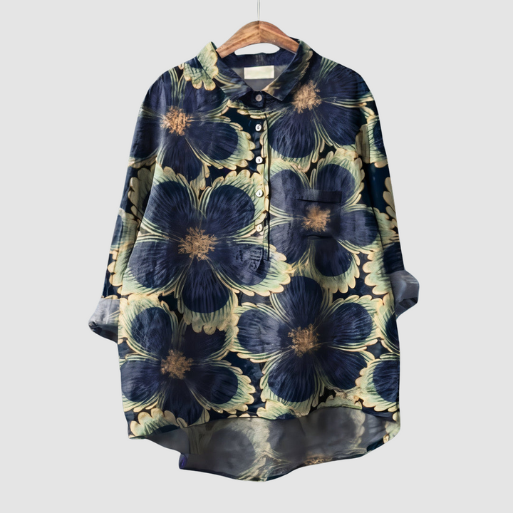 Navy floral print button-up blouse with pointed collar and chest pocket, gold outlines