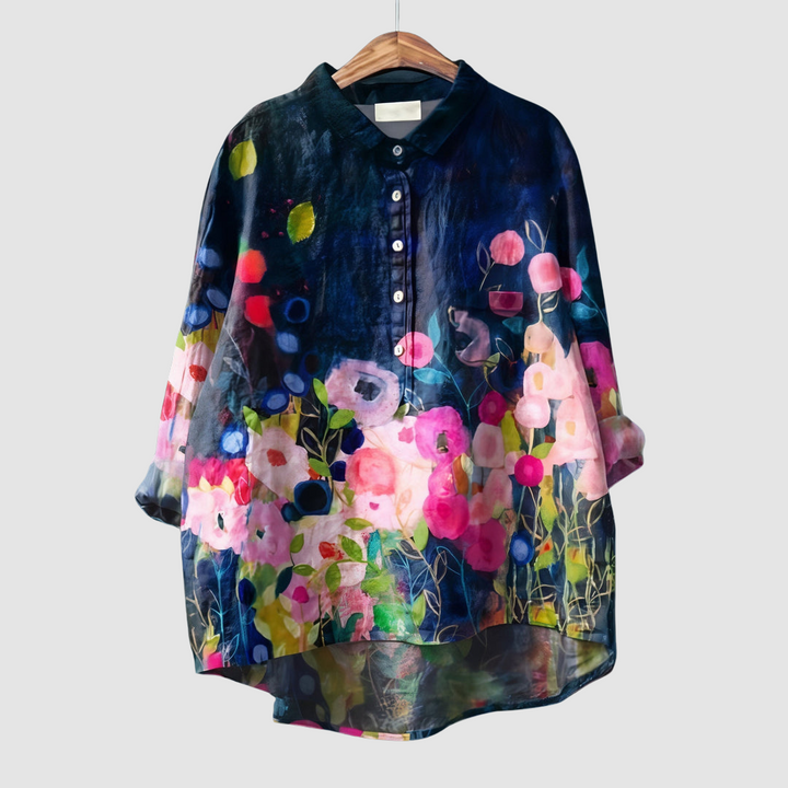 Dark floral print blouse with button front, pointed collar, long sleeves, navy base