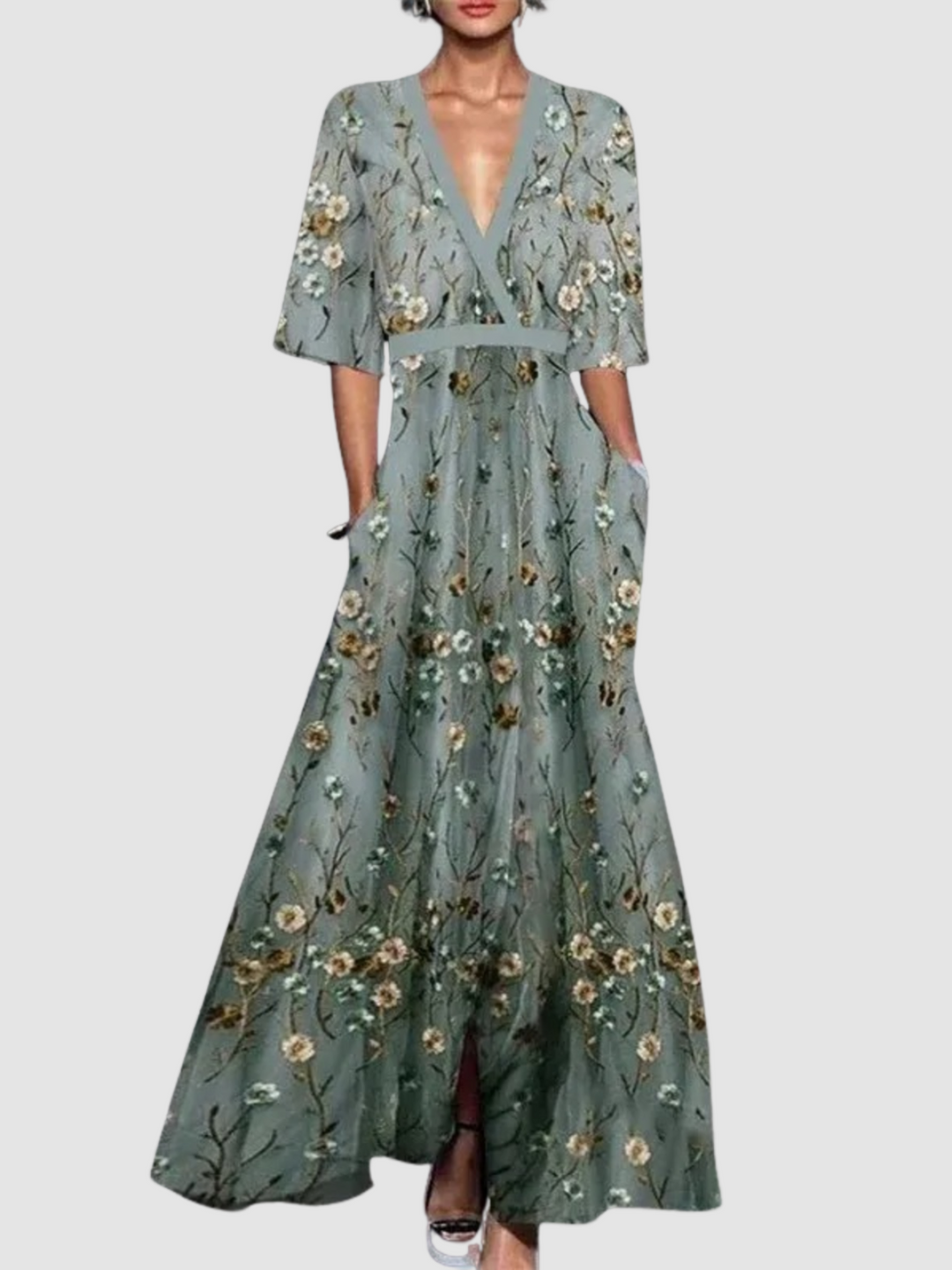 Elegant long floral dress in muted green with V-neck, half sleeves, and cinched waist