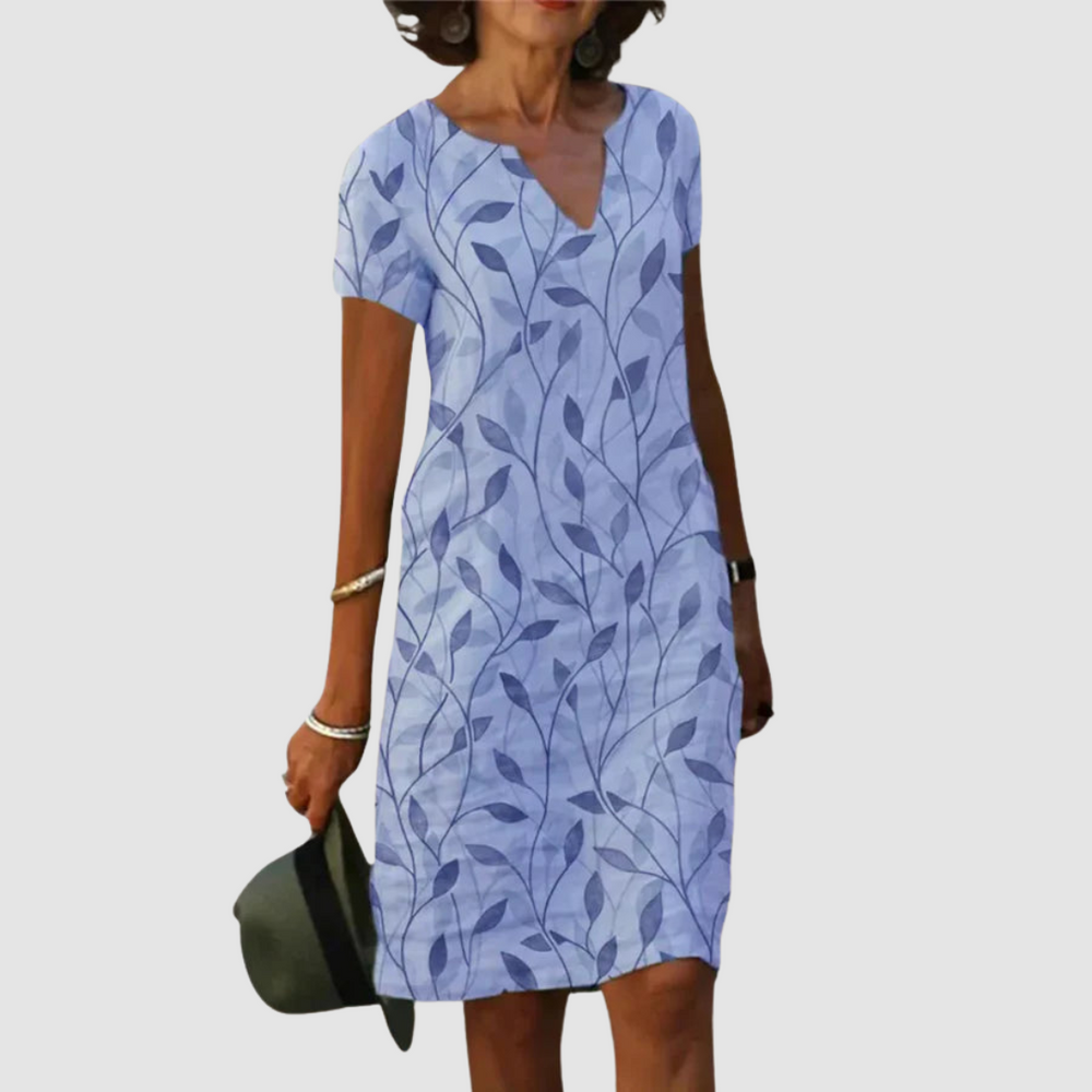 Casual printed dress in blue with leaf pattern, short sleeves, V-neck.