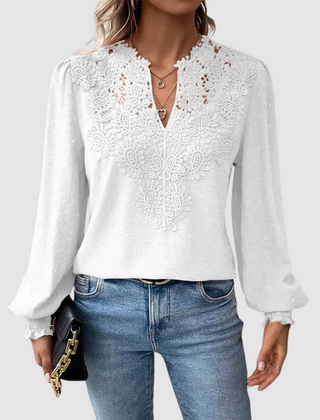 White lace blouse with V-neck and long puff sleeves