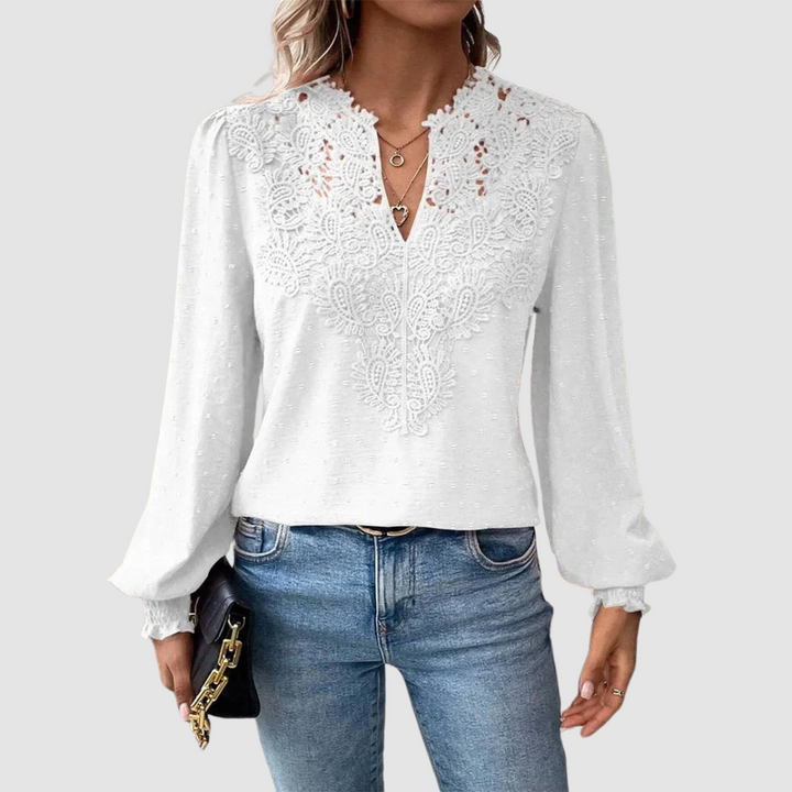 White luxury lace blouse with V-neck and long bell sleeves, ornate lace yoke trim