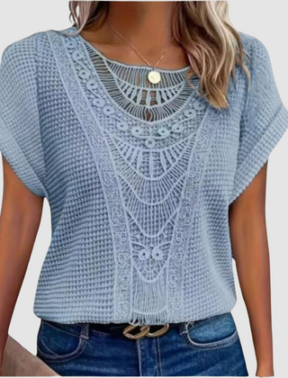 Light blue lace crochet top with scalloped neckline and short flutter sleeves