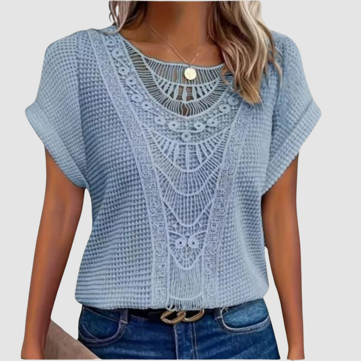 Light blue lace crochet top with scalloped neckline and short flutter sleeves