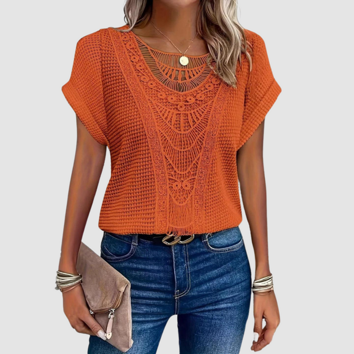 Orange lace crochet top with scalloped neckline and short flutter sleeves