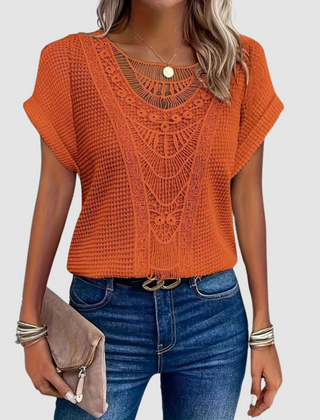 Sophie™ chic lace top in orange knit with scalloped lace yoke and short sleeves.