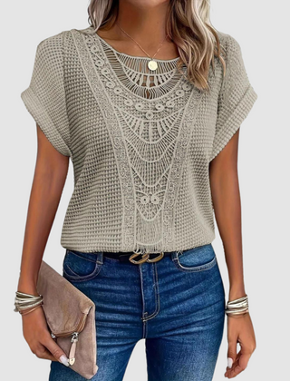 Cream-beige lace crochet top with scalloped neckline and short flutter sleeves