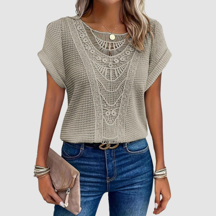 Sophie™ chic lace top in light beige knit with scalloped lace yoke and short sleeves.