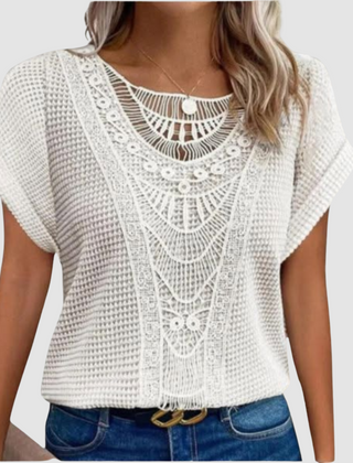 Sophie™ chic lace top in white knit with scalloped lace yoke and short sleeves.