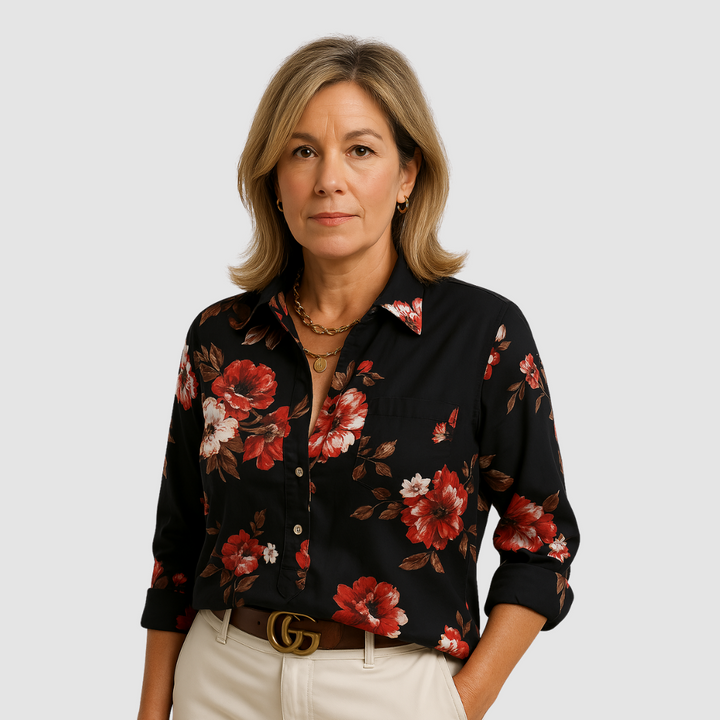 Black floral pocket blouse with button-front and collared neckline