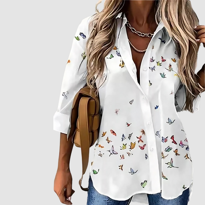 White button-up blouse with scattered multicolor butterfly insect print