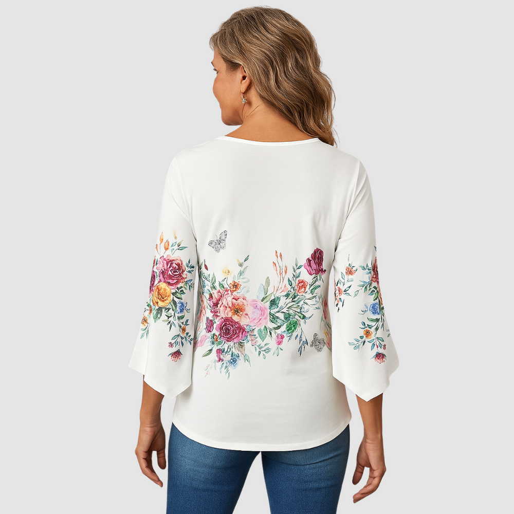 Soft white floral blouse, scoop back, three-quarter sleeves with flared cuffs