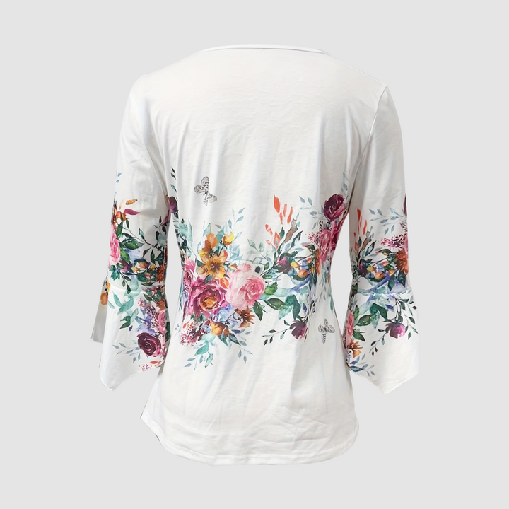 Soft white floral blouse back with 3/4 flared sleeves and button placket