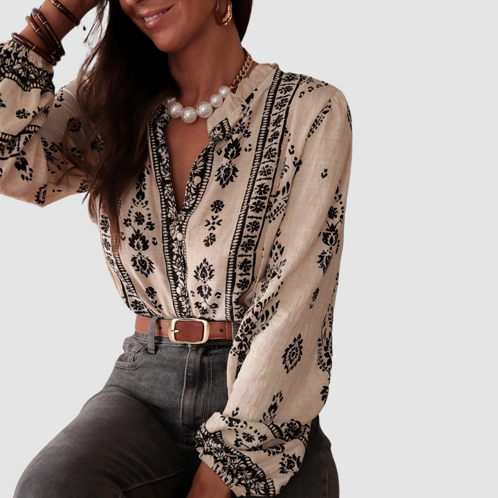 Soft beige boho blouse with black border floral pattern, long sleeves, V-neck