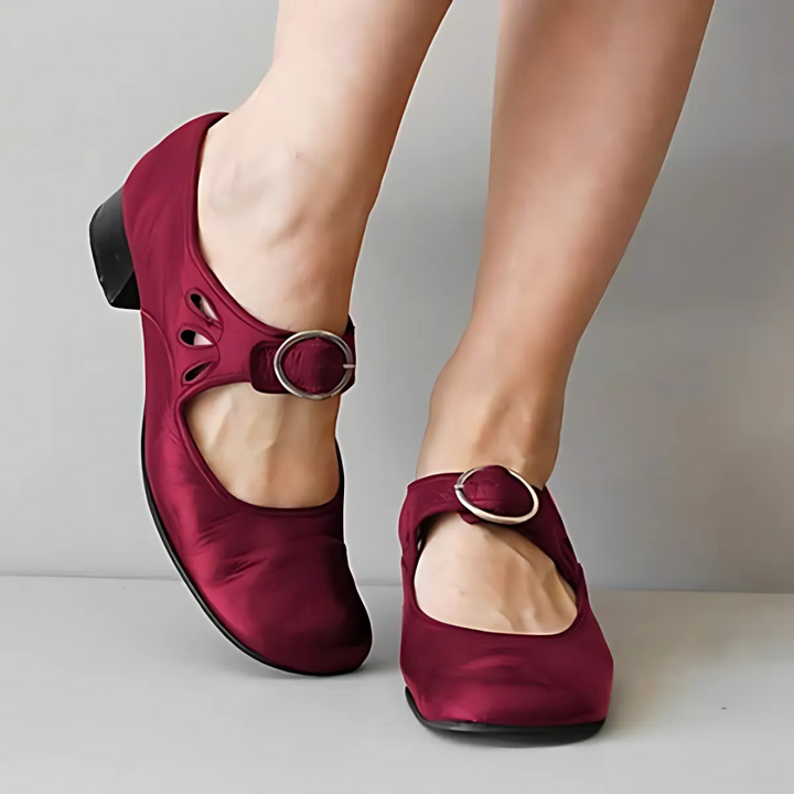 Red leather sandals with oval buckle strap and cutout toe, low block heel