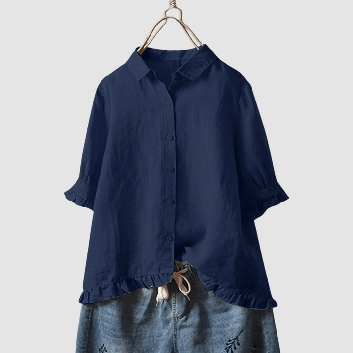 Navy breathable button-front blouse with short sleeves and ruffled hem