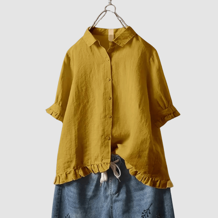 Mustard yellow breathable button-up blouse with short sleeves and ruffled hem