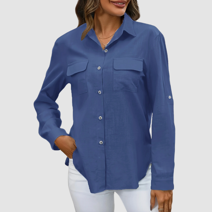 Navy blue front pocket blouse with long sleeves and button closure