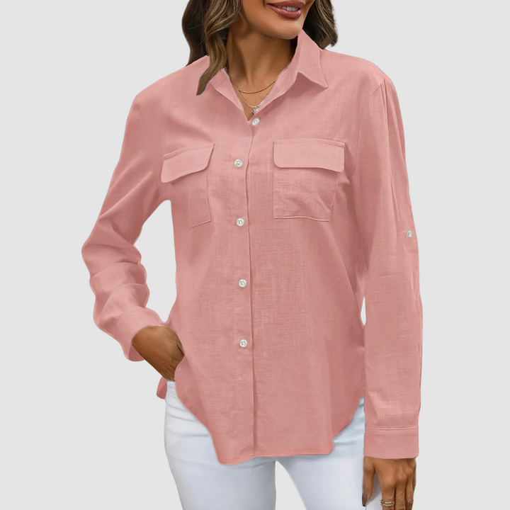 Women's pink button-up blouse with collared neckline and chest flap pockets