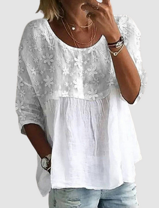 White loose-fit shirt with floral print yoke, gathered waist, three-quarter sleeves