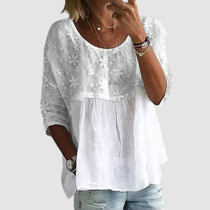 White loose-fit shirt with floral print yoke, gathered waist, three-quarter sleeves