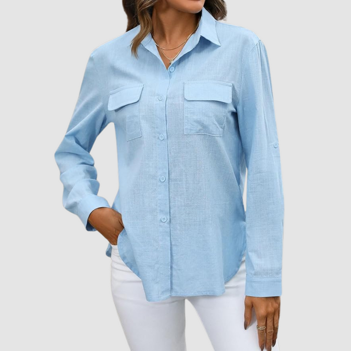 Light blue pocket blouse with button-front and two chest patch pockets