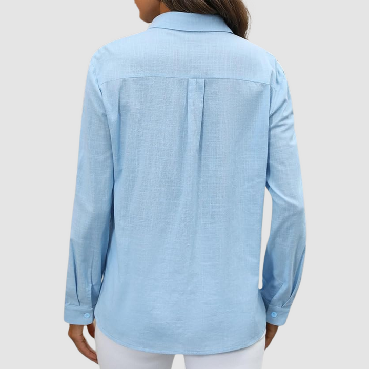 Celest™ pocket blouse in light blue, back view with yoke and long sleeves