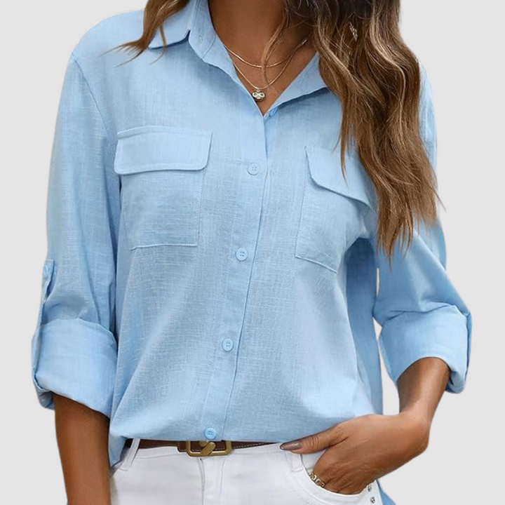 Light blue pocket blouse with button-front and two chest patch pockets