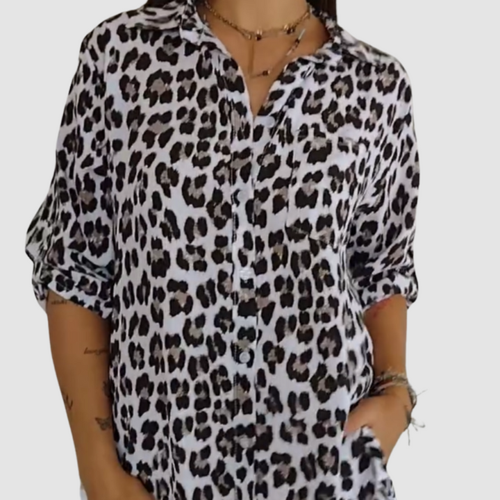 White leopard-print button-front blouse with pointed collar and 3/4 sleeves