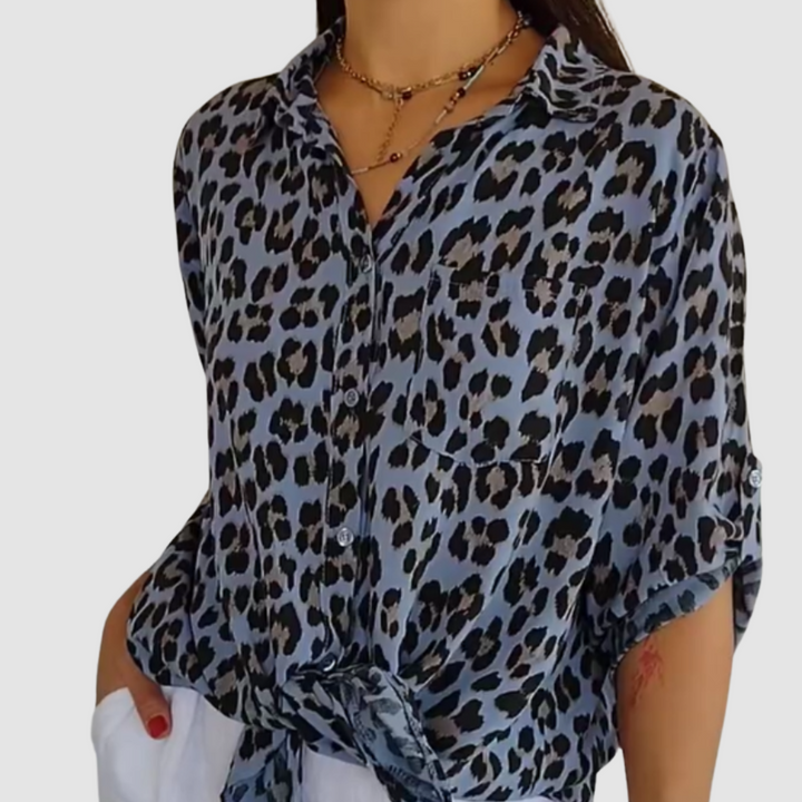 Blue leopard-print button-front blouse with pointed collar and tied front hem