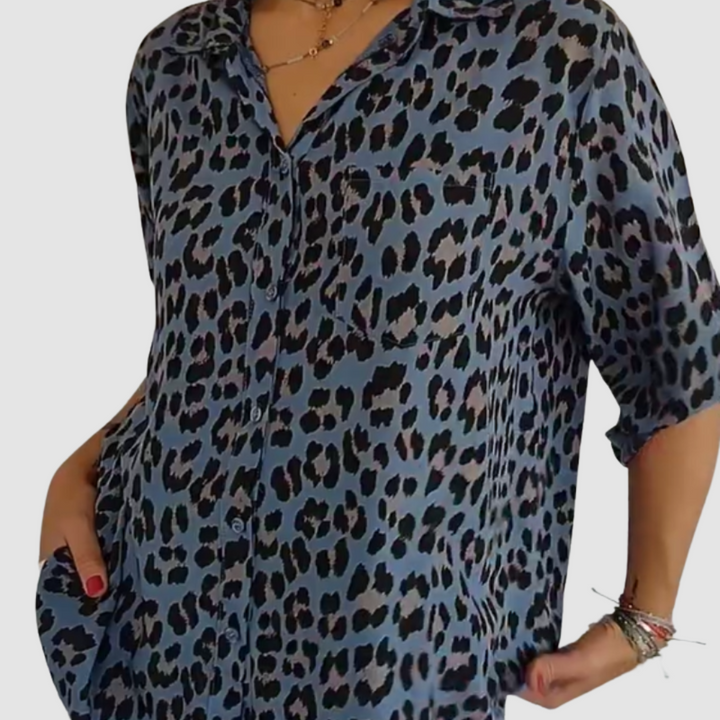 Blue leopard-print button-front blouse with pointed collar and 3/4 sleeves