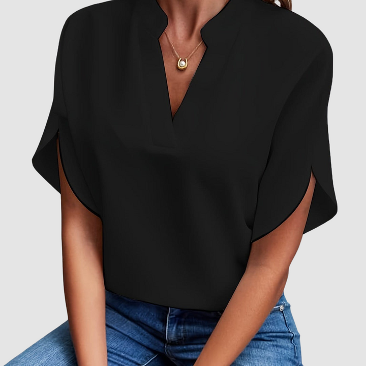 Black draped V-neck blouse with short dolman sleeves and relaxed fit