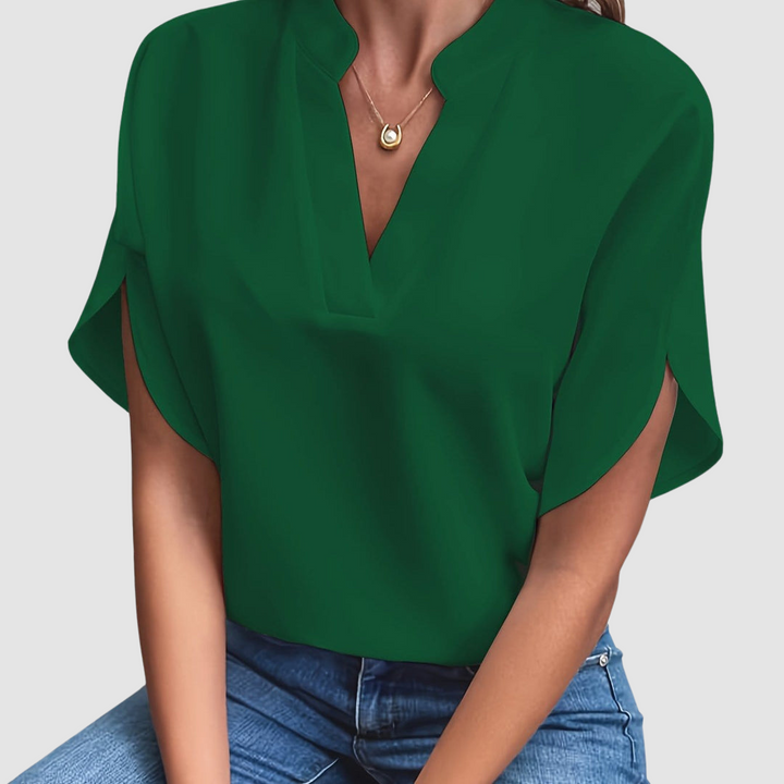 Green draped blouse with V-neck and loose dolman short sleeves
