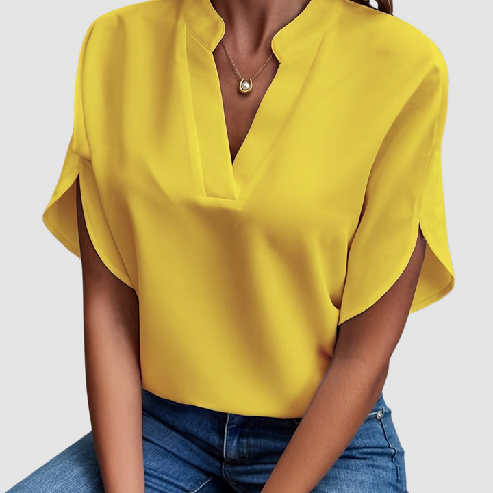 Yellow draped blouse with V-neck and loose dolman short sleeves