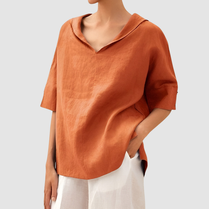 Orange short-sleeve blouse with V-neck and pointed collar, relaxed fit