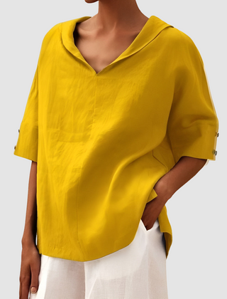 Yellow short-sleeve blouse with V-neck and pointed collar, relaxed fit