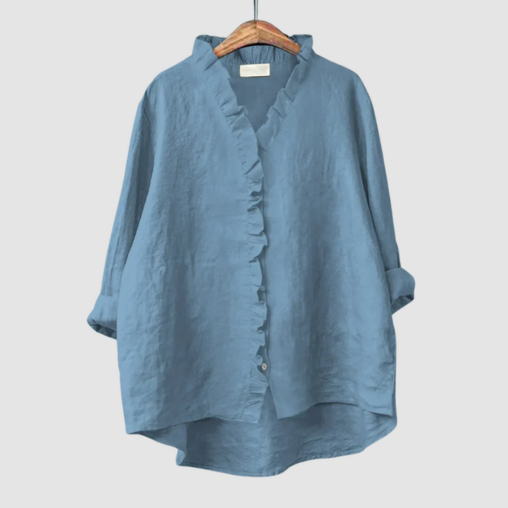 Blue ruffle-front blouse with three-quarter sleeves