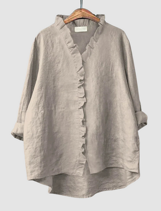 Gray breathable blouse with ruffled V-neck and button-front, rolled sleeves