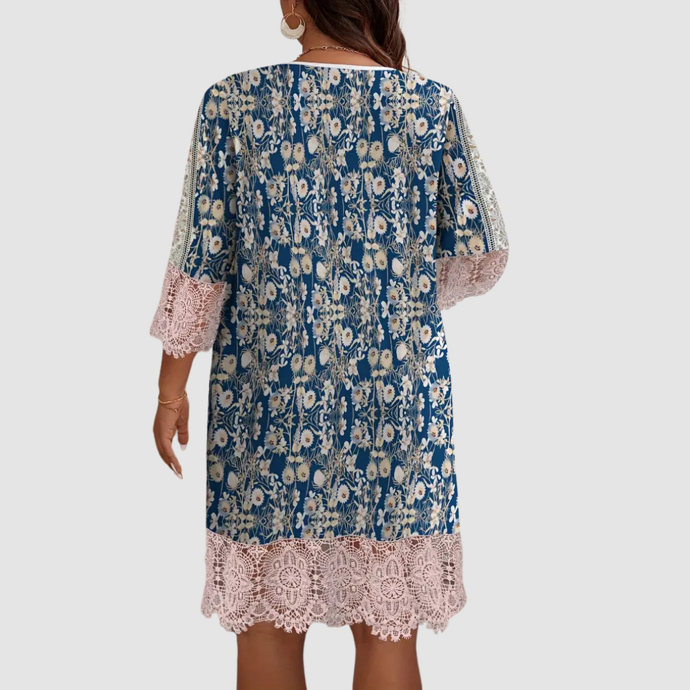 Back view boho dress with blue floral print, lace cuffs, crochet lace hem