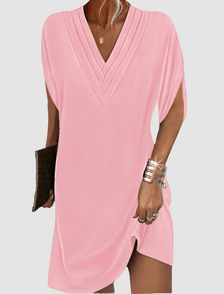 Pink V-neck half-sleeve dress with draped wrap-look neckline and short curved hem